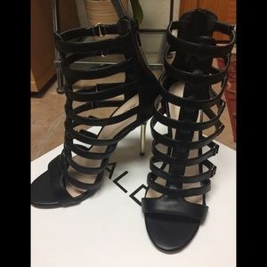 Aldo bold gladiator sandal with metal pencil heel